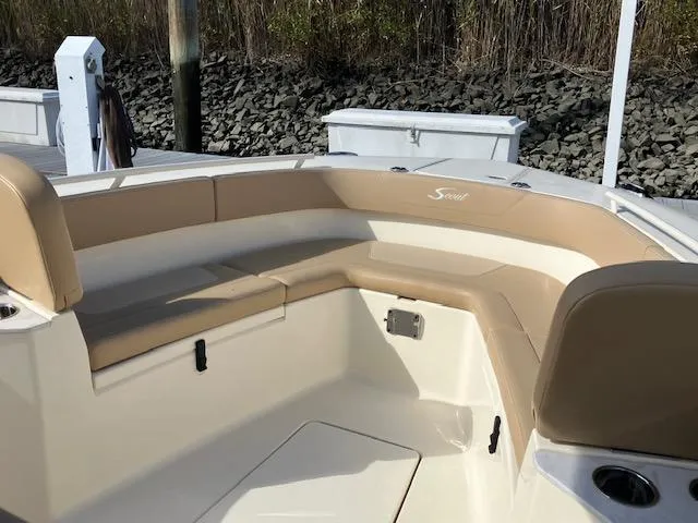 Slide: The Image of 2021 Scout 277 LXF boat with tan seating and sleek design. - 5