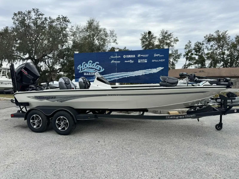 The Image of 2025 Ranger ALPHA 208 boat on trailer at Holiday Marine dealership. - 0
