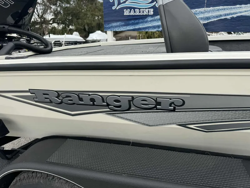Slide: The Image of Ranger ALPHA 208 boat, 2025 model, side view with logo and design details. - 10