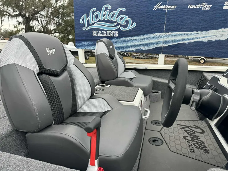 Slide: The Image of Interior of 2025 Ranger ALPHA 208 boat with comfortable seating and steering wheel. - 7