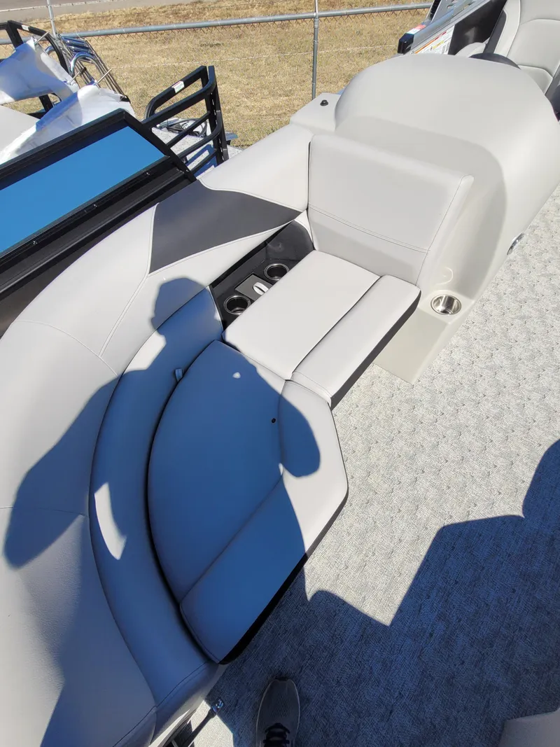 Slide: The Image of 2025 Trifecta 22TRFCLE275 boat interior with gray seating and cup holders. - 5