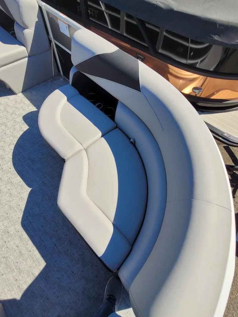 Slide: The Image of 2025 Trifecta 22TRFCLE275 boat with curved seating and modern design. - 6