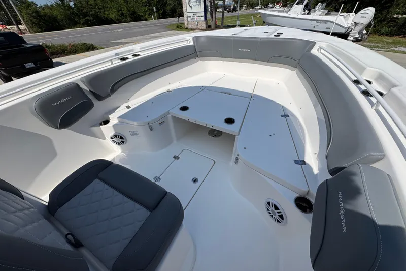 Slide: The Image of 2024 NauticStar 292 Legacy boat interior with spacious seating and modern design. - 20