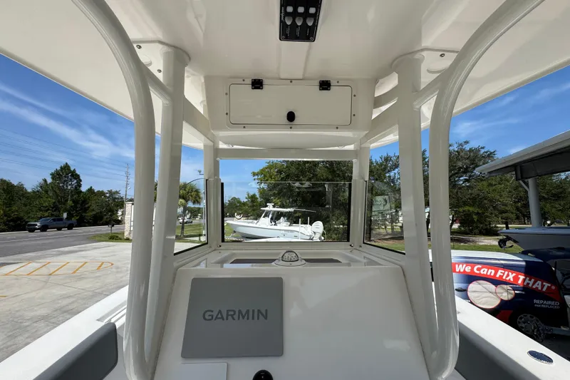 Slide: The Image of 2024 NauticStar 292 Legacy boat interior with Garmin navigation system. - 31