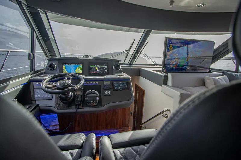 Slide: The Image of Luxurious 2024 Riviera 4600 SY yacht interior with advanced navigation system. - 47