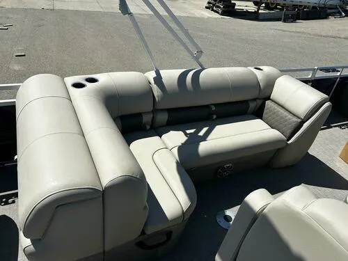 Slide: The Image of 2025 Sun Tracker Fishin' Barge 20 DLX, beige seating area on deck. - 10