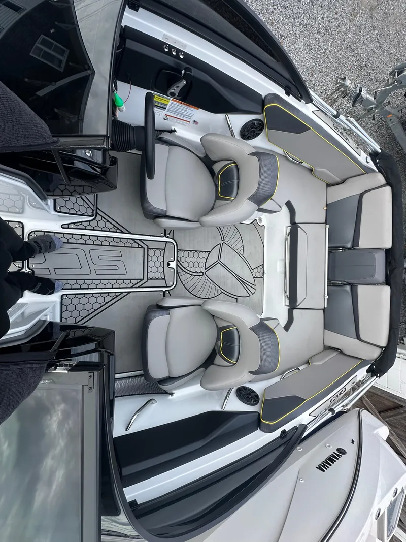 Slide: The Image of 2020 Scarab 195 ID boat interior with modern seating and sleek design. - 14