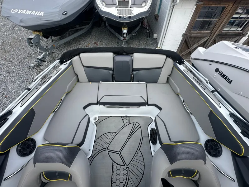 Slide: The Image of 2020 Scarab 195 ID boat interior with gray seating and stylish design. - 9