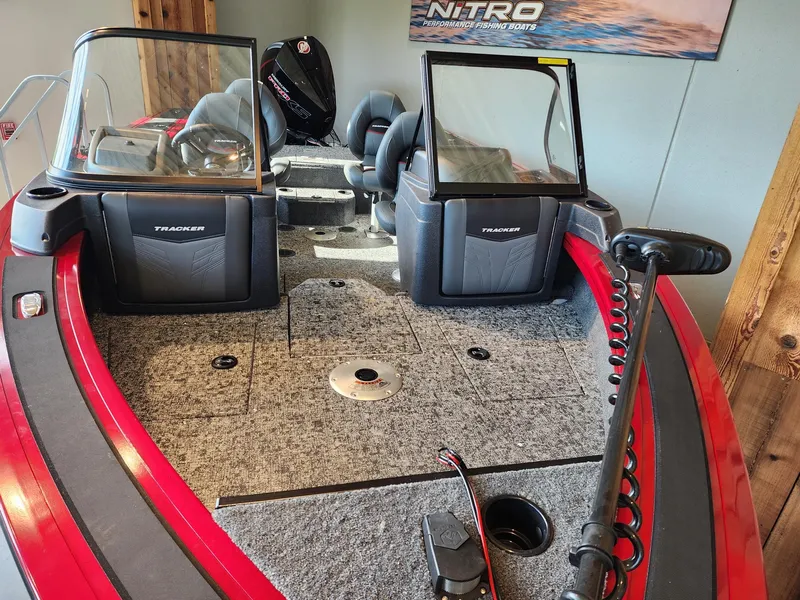 Slide: The Image of 2025 Tracker Targa V-18 WT fishing boat interior with seating and equipment. - 4