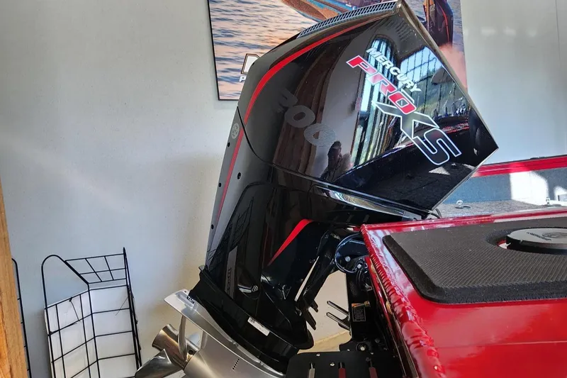 Slide: The Image of 2025 Tracker Targa V-18 WT with Mercury Pro XS outboard motor in showroom. - 5