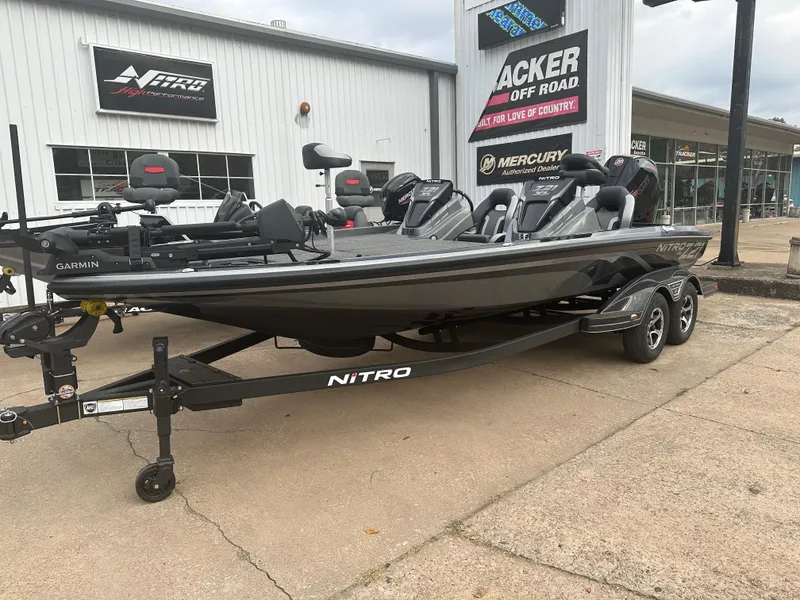 The Image of 2025 Nitro Z21 XL Pro boat on trailer outside dealership. - 0
