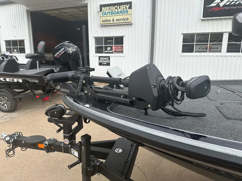 Slide: The Image of 2025 Nitro Z21 XL Pro boat with Garmin equipment at Mercury Outboards dealership. - 9