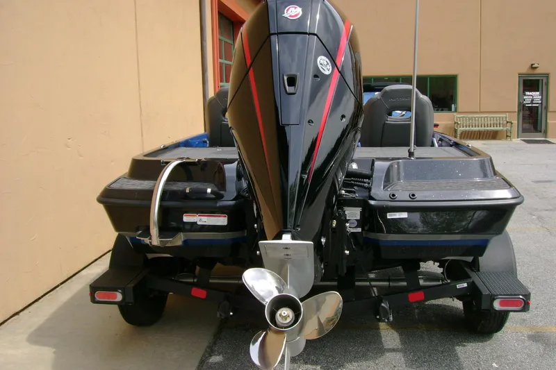 Slide: The Image of Rear view of a 2025 Nitro Z19 boat with powerful outboard motor. - 6
