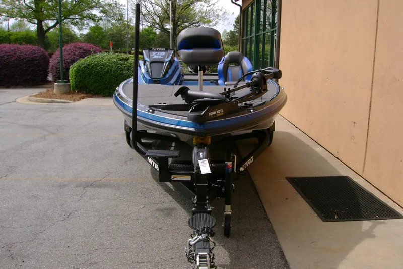 Slide: The Image of 2025 Nitro Z19 boat parked outdoors, featuring sleek design and modern equipment. - 9