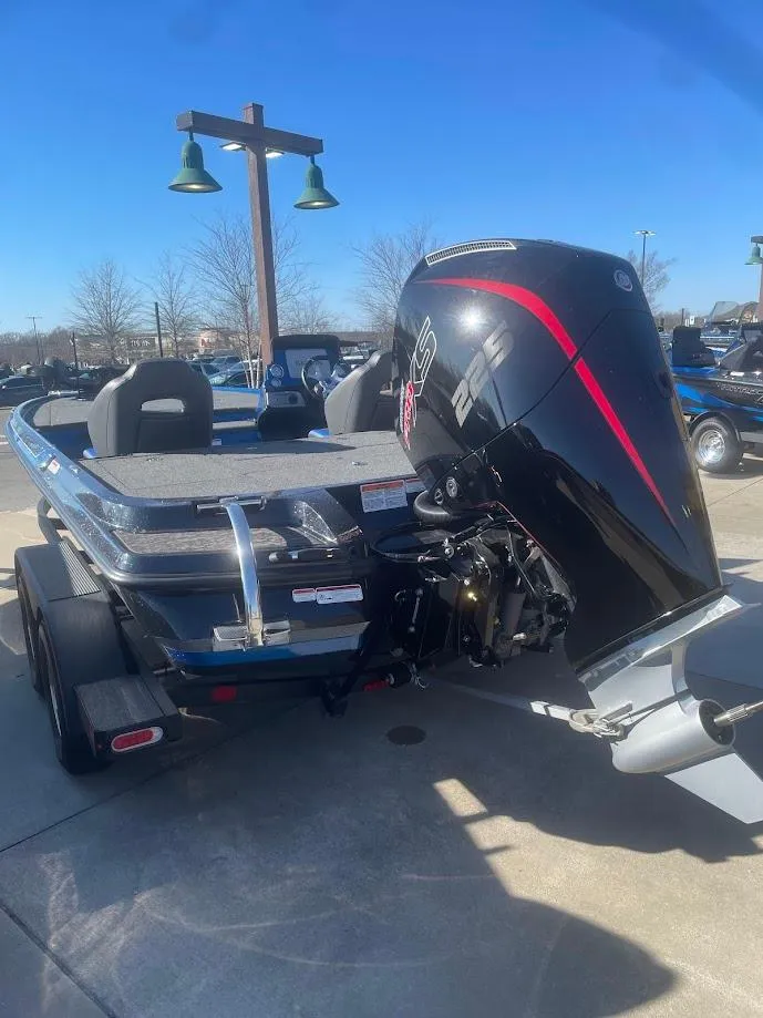 Slide: The Image of 2025 Nitro Z20 XL boat with powerful outboard motor, parked outdoors. - 3