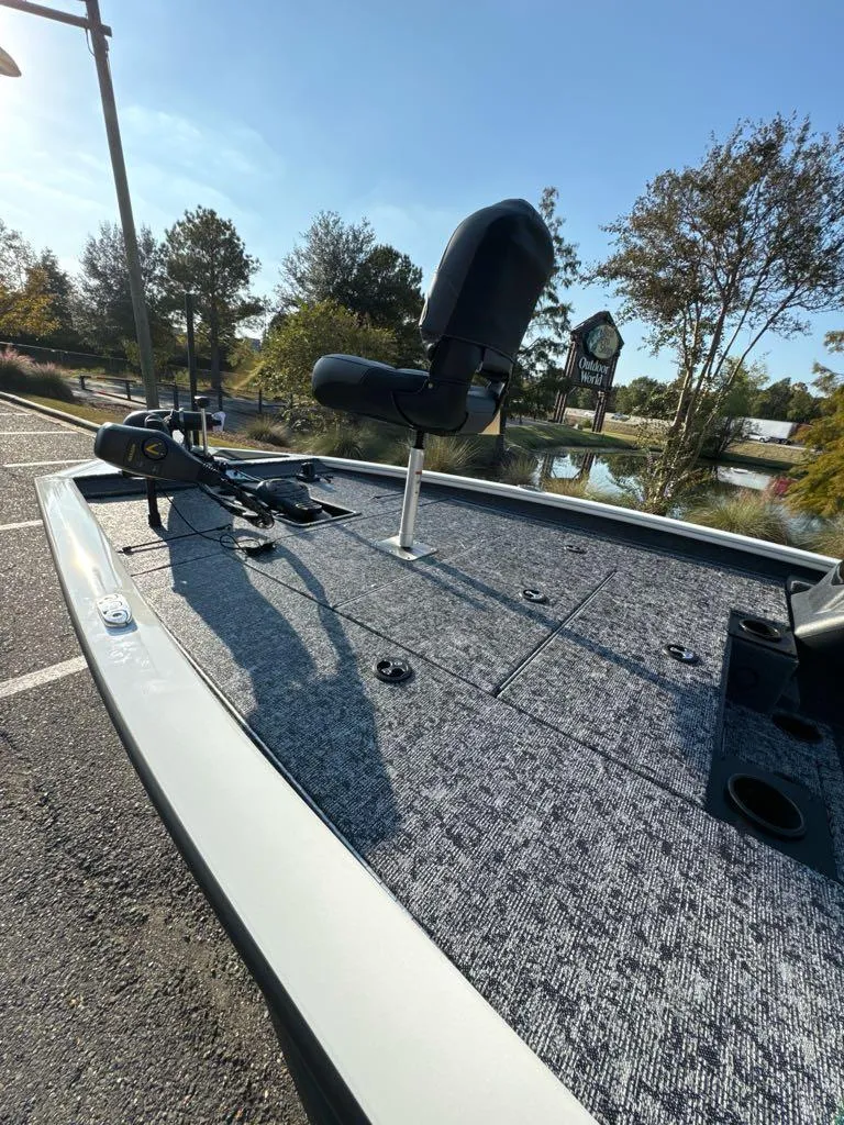 Slide: The Image of 2025 Tracker Pro Team 195 Tournament Edition boat, sleek design, parked outdoors. - 4