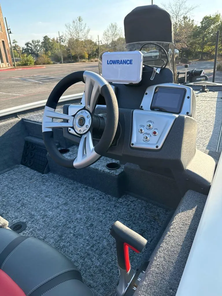 Slide: The Image of 2025 Tracker Pro Team 195 Tournament Edition boat dashboard with Lowrance electronics. - 7