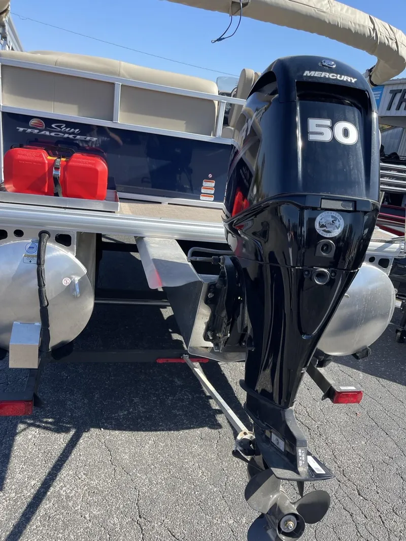 Slide: The Image of 2025 Sun Tracker Bass Buggy 16 XL Select with Mercury 50 outboard motor. - 2