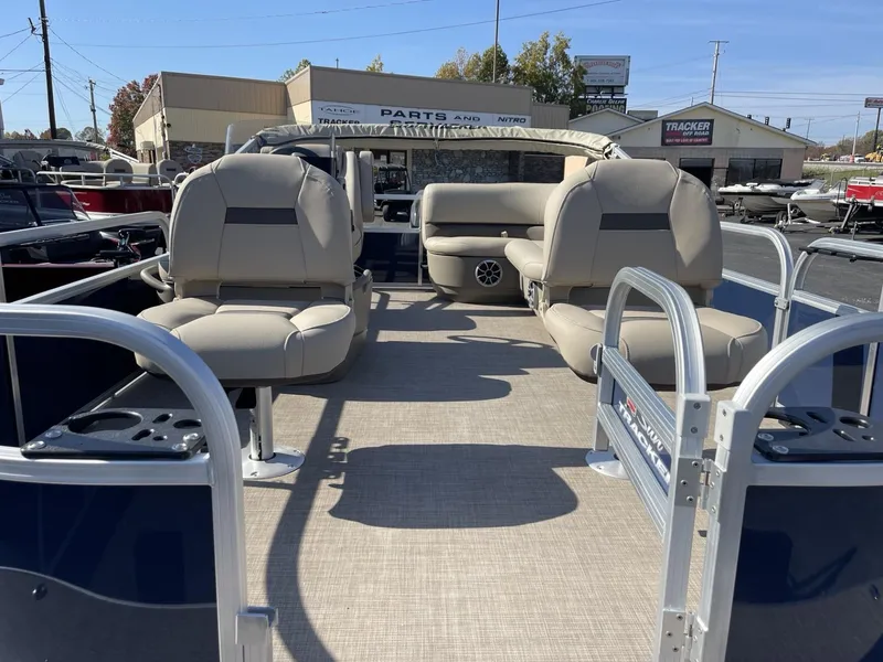 Slide: The Image of 2025 Sun Tracker Bass Buggy 16 XL Select pontoon boat interior with seating. - 5