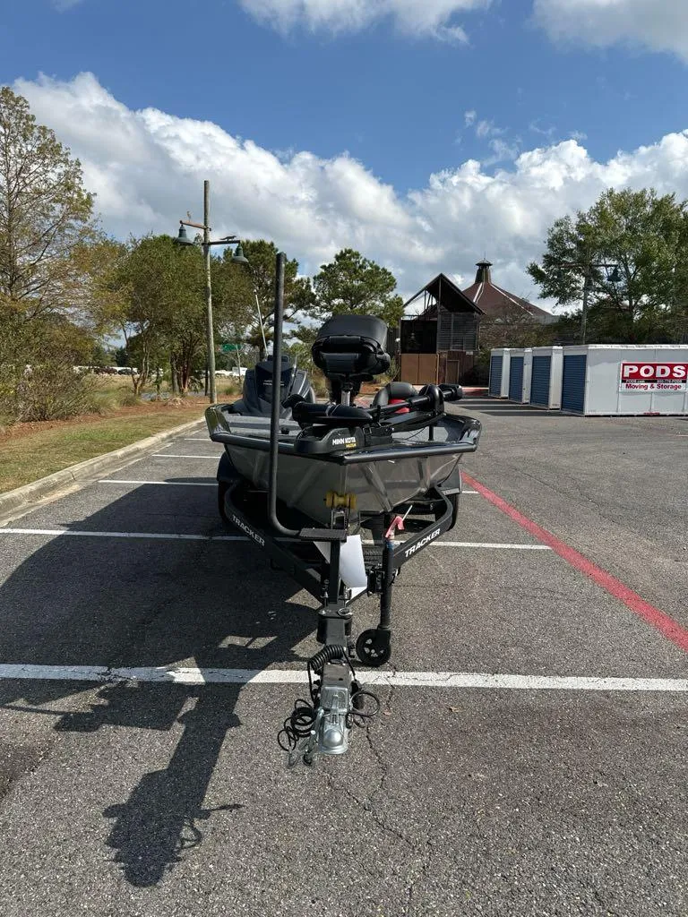 Slide: The Image of 2025 Tracker Pro Team 195 Tournament Edition boat in parking lot, sunny day. - 3