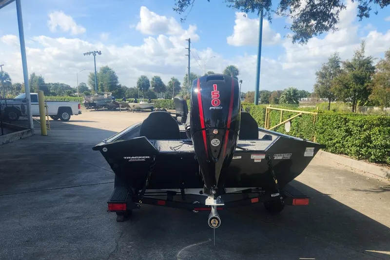 Slide: The Image of 2025 Tracker Pro Team 195 Tournament Edition boat with powerful outboard motor. - 5