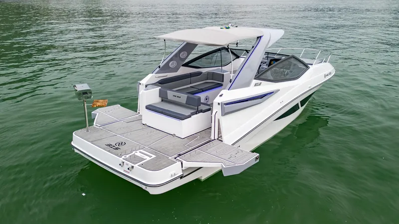 Slide: The Image of 2025 NHD 315 Open Deck boat on calm water, featuring spacious seating and modern design. - 10