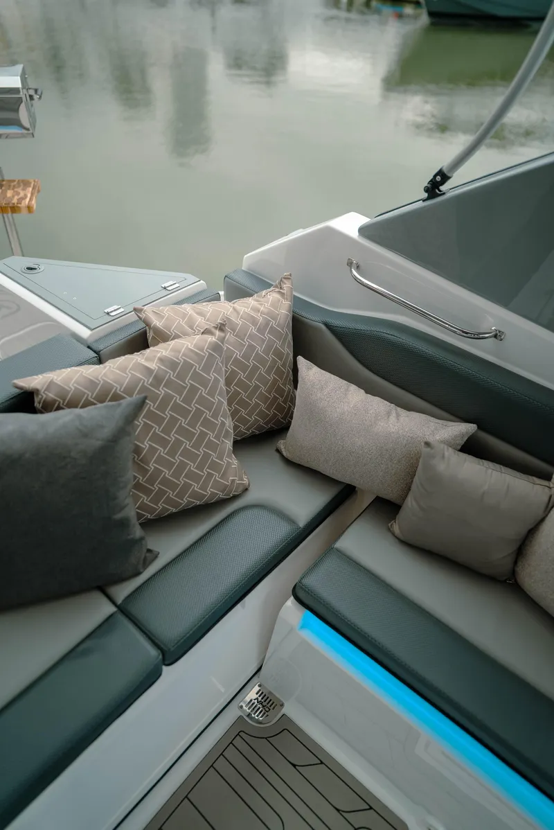 Slide: The Image of Luxurious seating area on 2025 NHD 315 Open Deck boat with stylish cushions. - 19