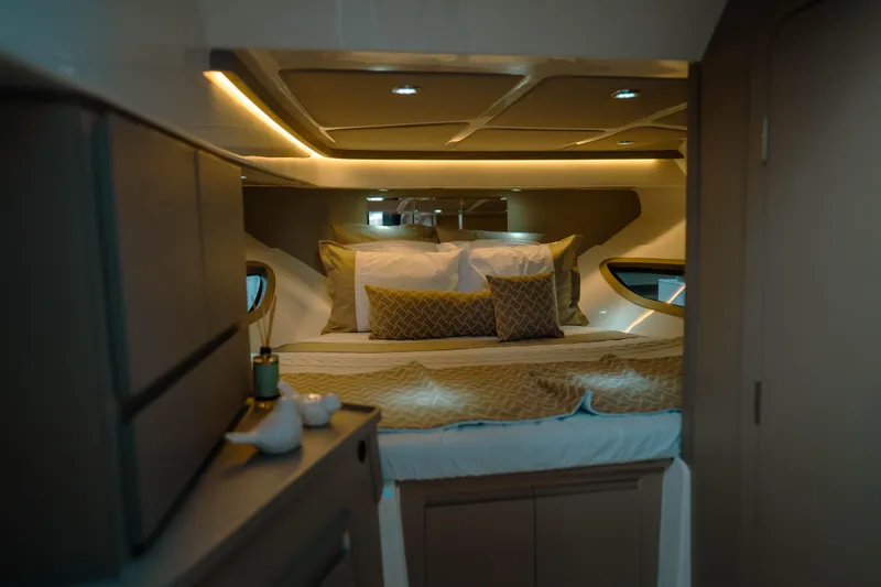 Slide: The Image of Luxurious cabin interior of 2025 NHD 315 Open Deck yacht, featuring elegant bedding and ambient lighting. - 20