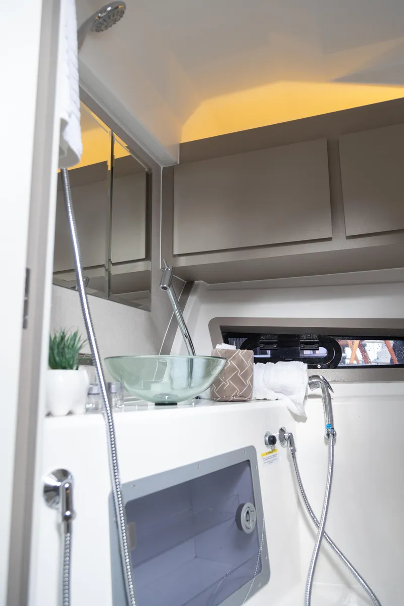 Slide: The Image of Modern bathroom interior on 2025 NHD 315 Open Deck boat. - 24