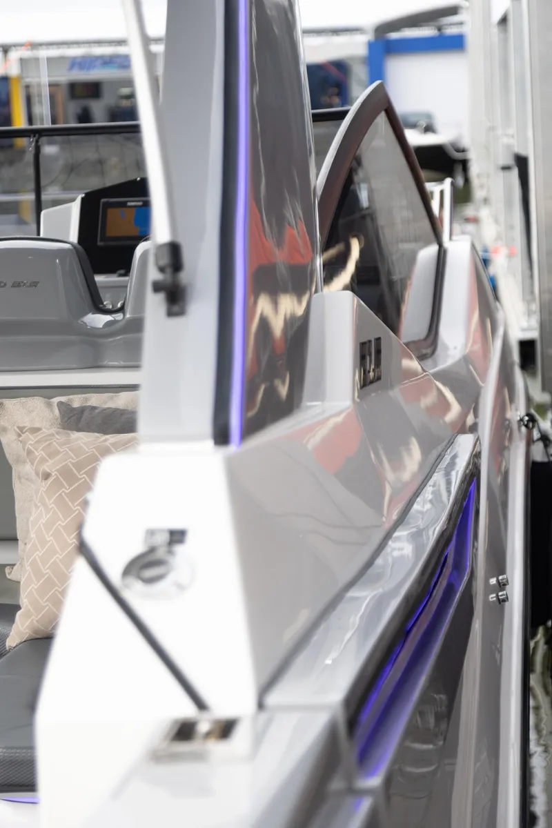 Slide: The Image of 2025 NHD 315 Open Deck boat with sleek design and modern features. - 26