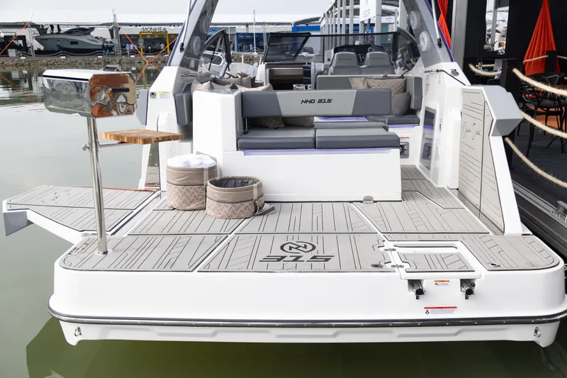 Slide: The Image of 2025 NHD 315 Open Deck boat with spacious seating and modern design. - 27