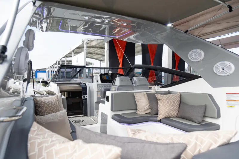 Slide: The Image of Luxurious 2025 NHD 315 Open Deck boat interior with plush seating and modern design. - 30