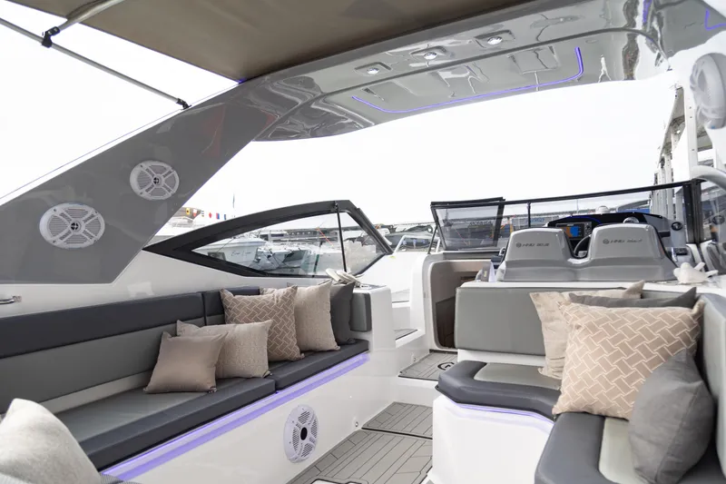 Slide: The Image of Luxurious 2025 NHD 315 Open Deck boat interior with plush seating and modern design. - 31