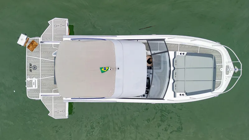 Slide: The Image of Aerial view of 2025 NHD 315 Open Deck boat on water. - 9