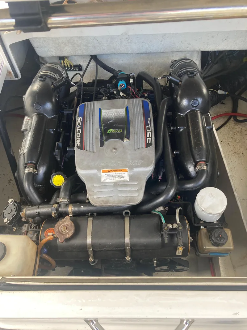 Slide: The Image of 2013 Cobalt 24SD engine compartment with SeaCore 350 engine. - 23