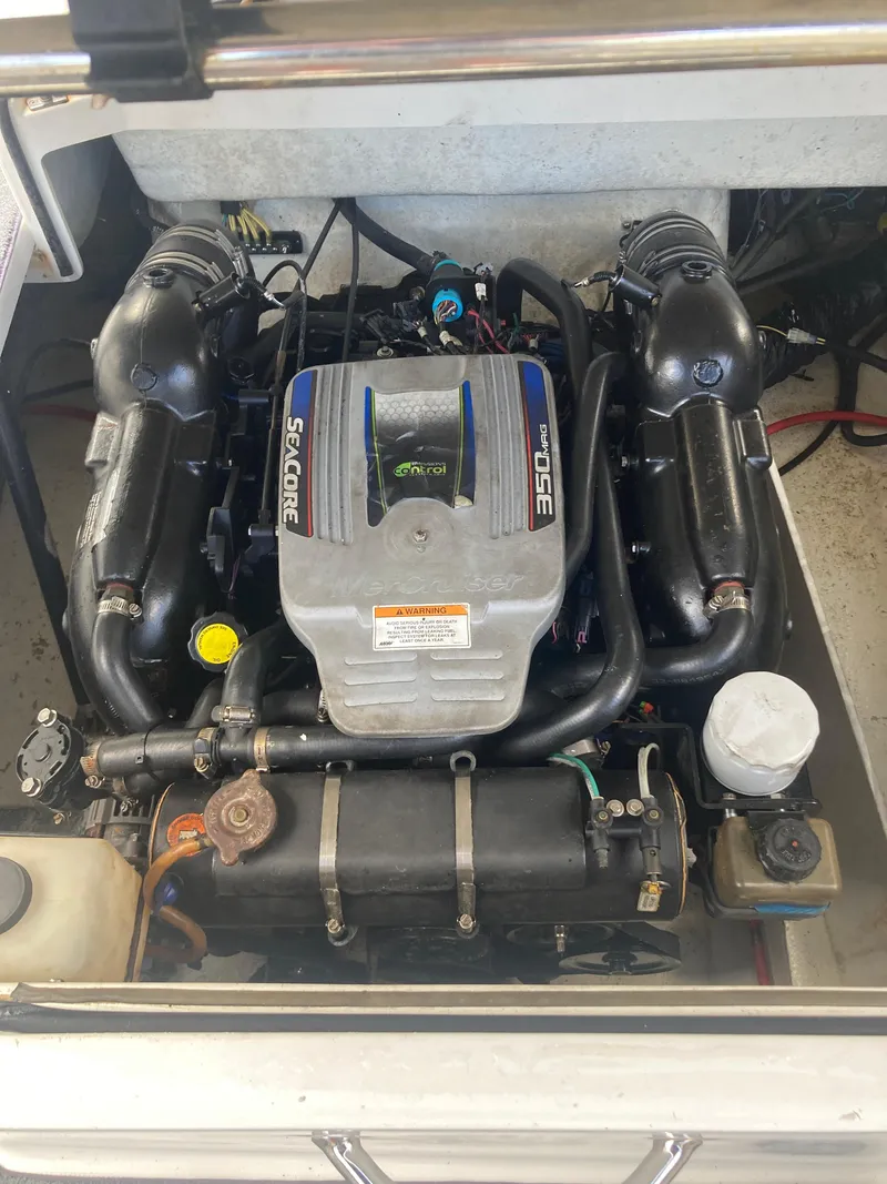 Slide: The Image of 2013 Cobalt 24SD boat engine, detailed view of SeaCore system. - 24