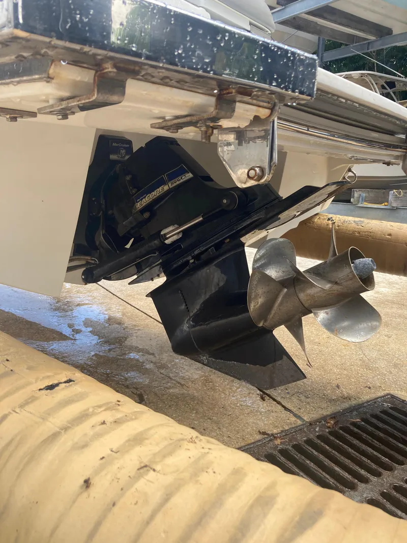 Slide: The Image of 2013 Cobalt 24SD boat propeller and stern drive close-up. - 29