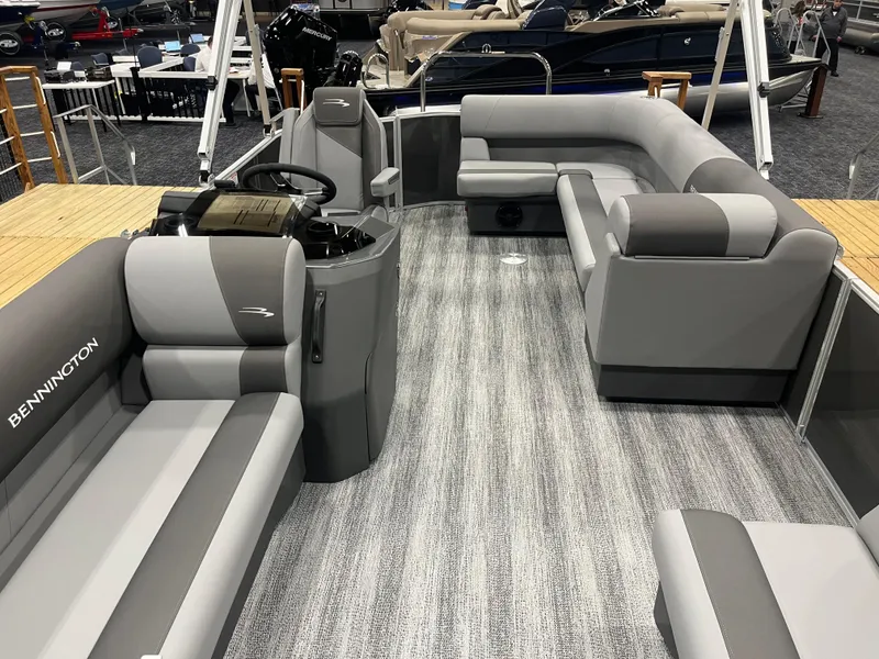 Slide: The Image of 2025 Bennington S Line pontoon boat interior with gray seating and modern design. - 3