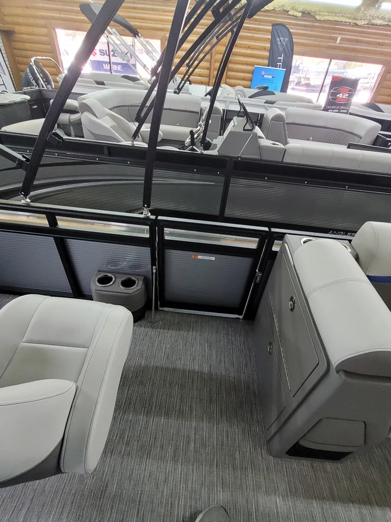 Slide: The Image of 2025 Quest 22 LE boat interior with modern seating and sleek design. - 16