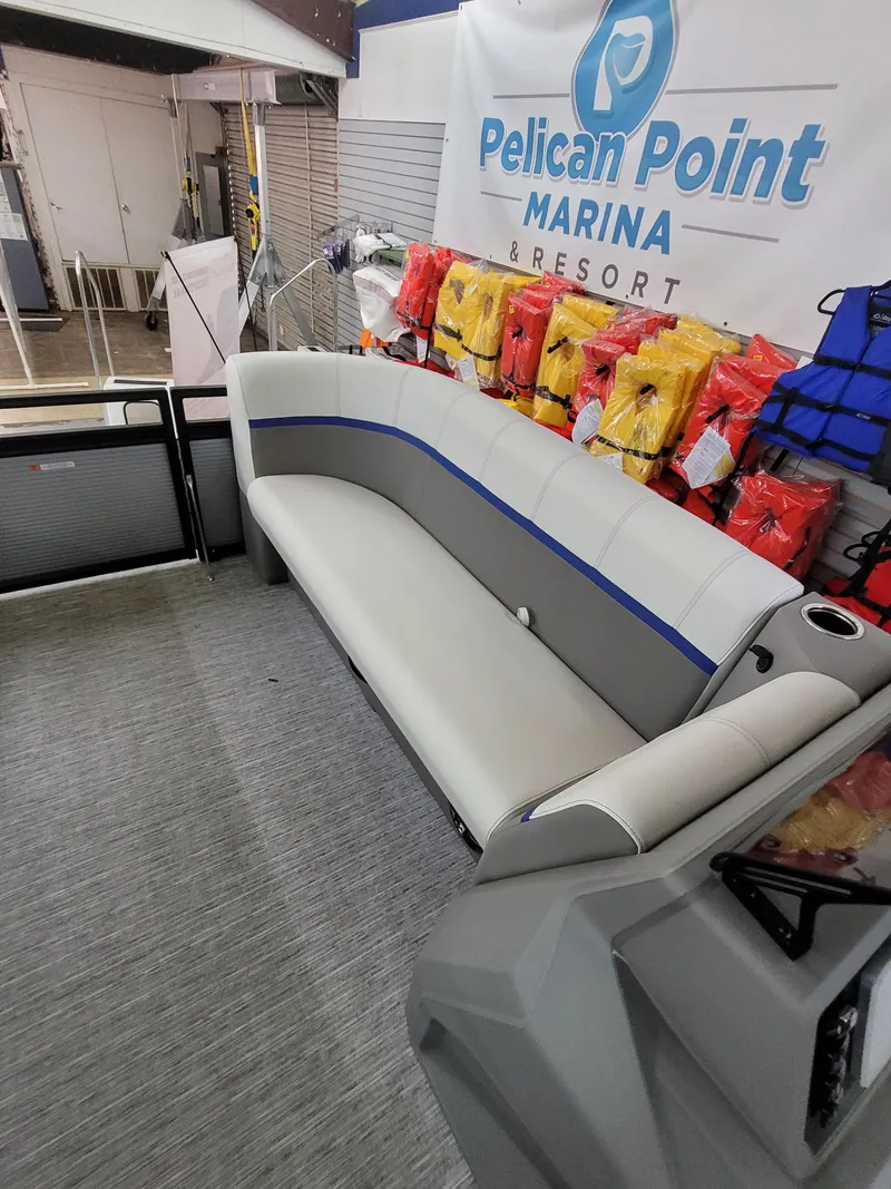 Slide: The Image of 2025 Quest 22 LE boat interior with seating at Pelican Point Marina. - 17