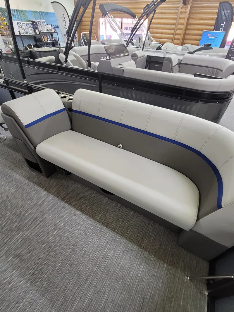 Slide: The Image of 2025 Quest 22 LE boat interior with gray and blue seating. - 19