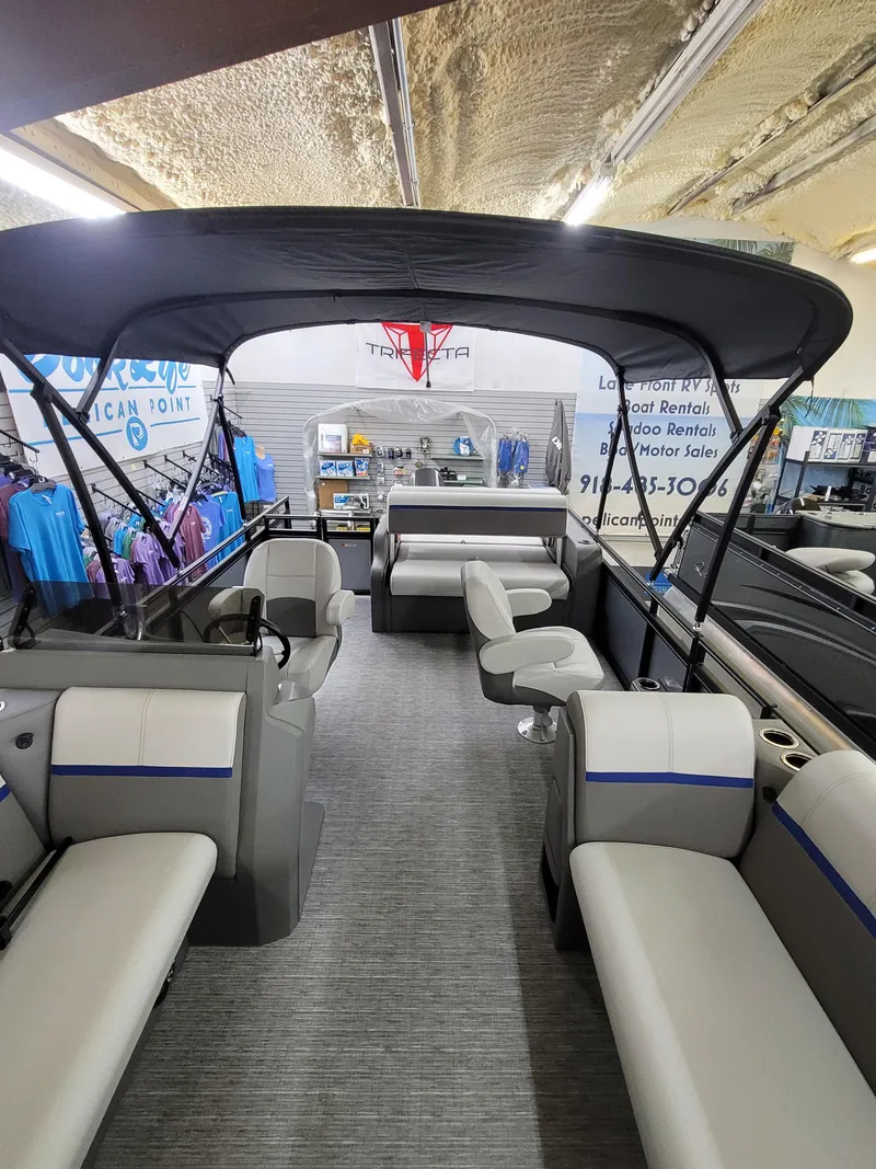 Slide: The Image of 2025 Quest 22 LE pontoon boat interior with seating and canopy. - 20