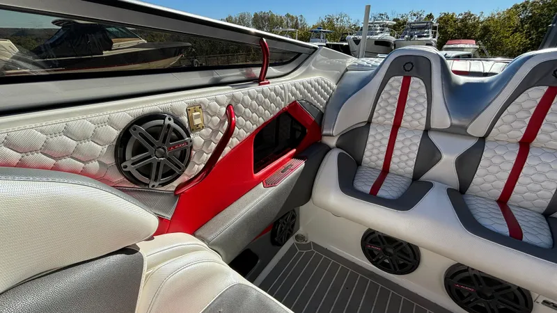 Slide: The Image of Interior of a 2008 Fountain 47 Lightning boat with stylish seating and speaker system. - 16