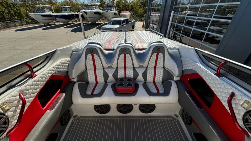Slide: The Image of Interior of 2008 Fountain 47 Lightning boat with red and gray seating. - 19