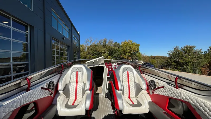 Slide: The Image of Interior of 2008 Fountain 47 Lightning boat with red and white seating. - 20