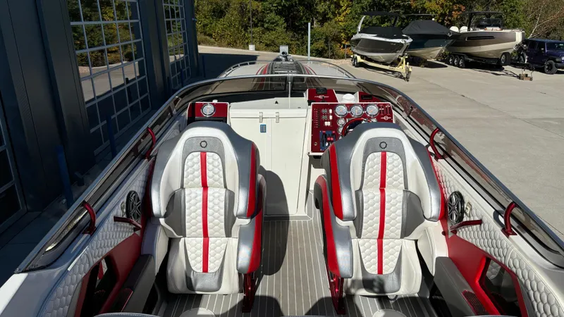 Slide: The Image of Interior of 2008 Fountain 47 Lightning speedboat with red and white seating. - 43