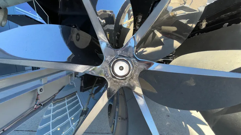 Slide: The Image of Close-up of a 2008 Fountain 47 Lightning boat propeller, showcasing its sleek metallic blades. - 8