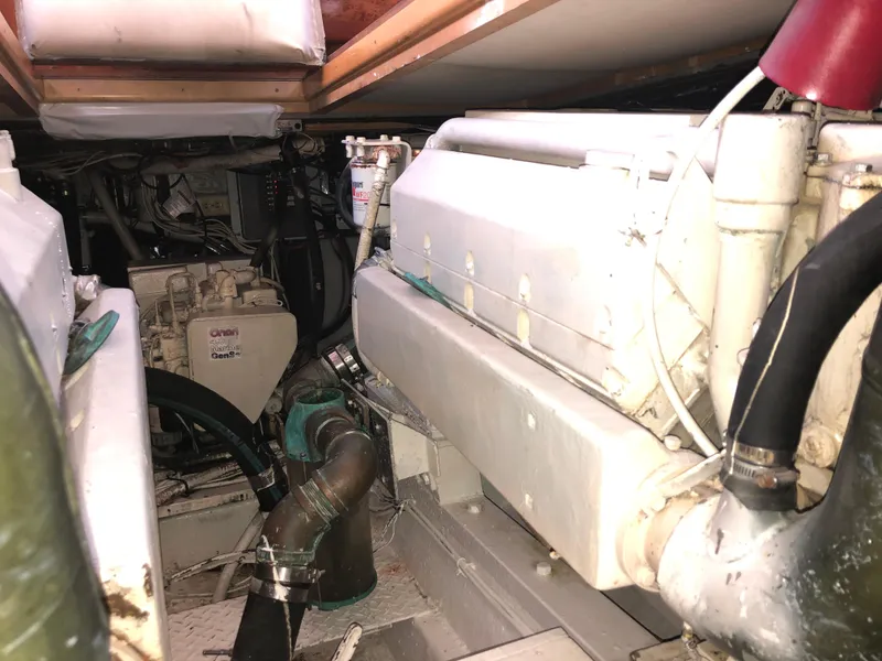 Slide: The Image of Engine room of 1971 Matthews Custom Pilothouse Motor Yacht, showcasing mechanical components. - 44