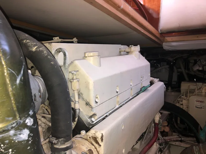 Slide: The Image of Engine room of 1971 Matthews Custom Pilothouse Motor Yacht, showcasing mechanical components. - 45