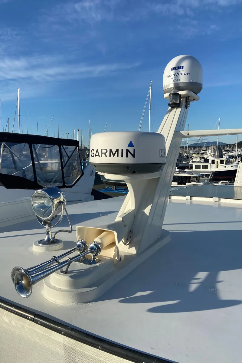 Slide: The Image of 1971 Matthews Custom Pilothouse Motor Yacht with Garmin radar and horn on deck. - 5